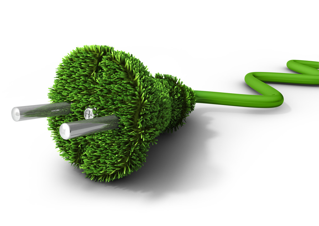 illustration of green energy by a green bush juxtaposed with an electrical plug